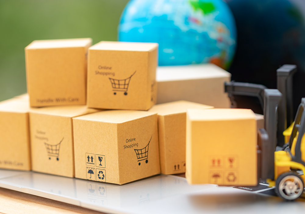 Mini,Forklift,Truck,Load,Cardboard,Box,With,Symbols,On,Laptop